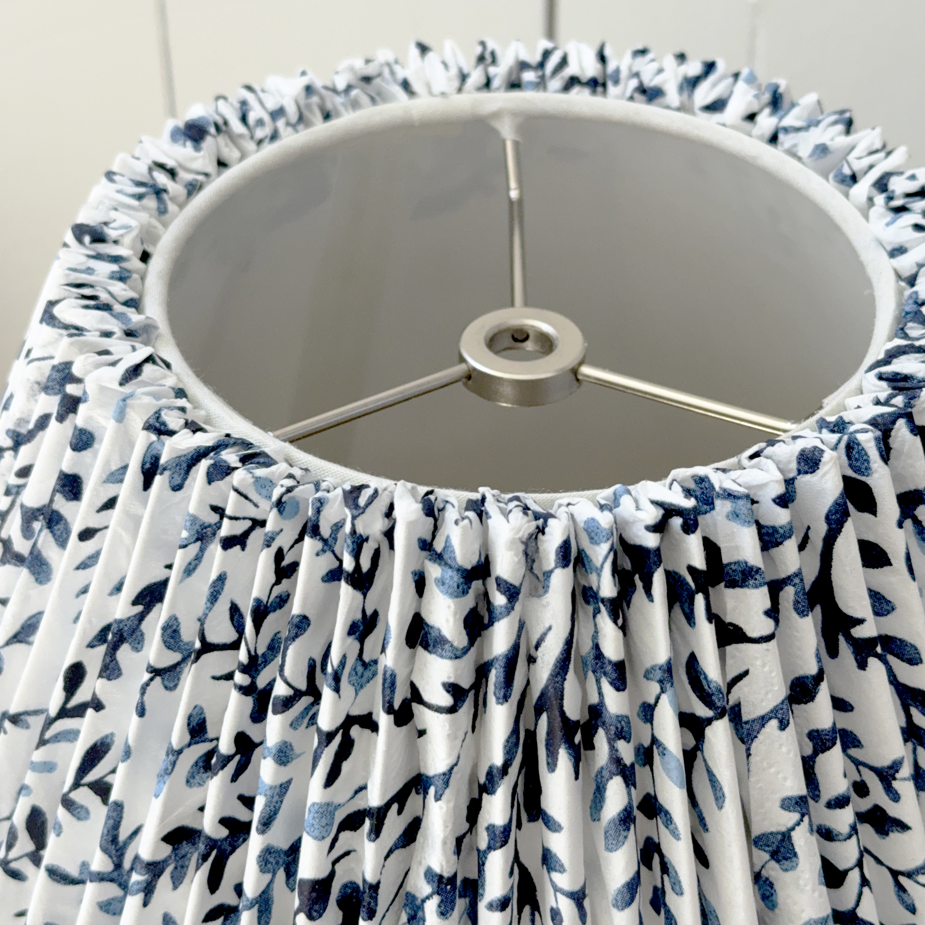 neat edge of pleated lampshade