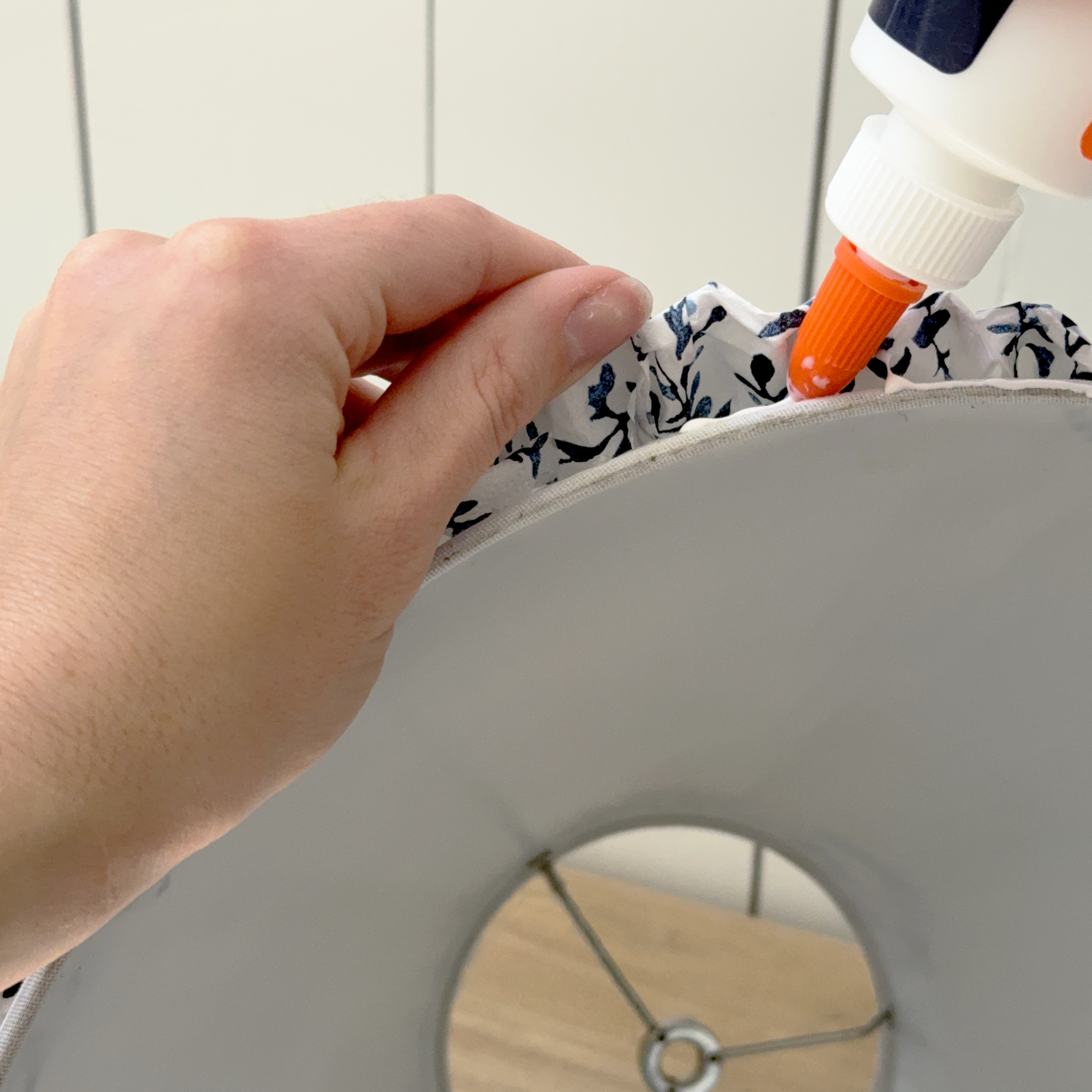 glueing edges of a paper napkin lampshade