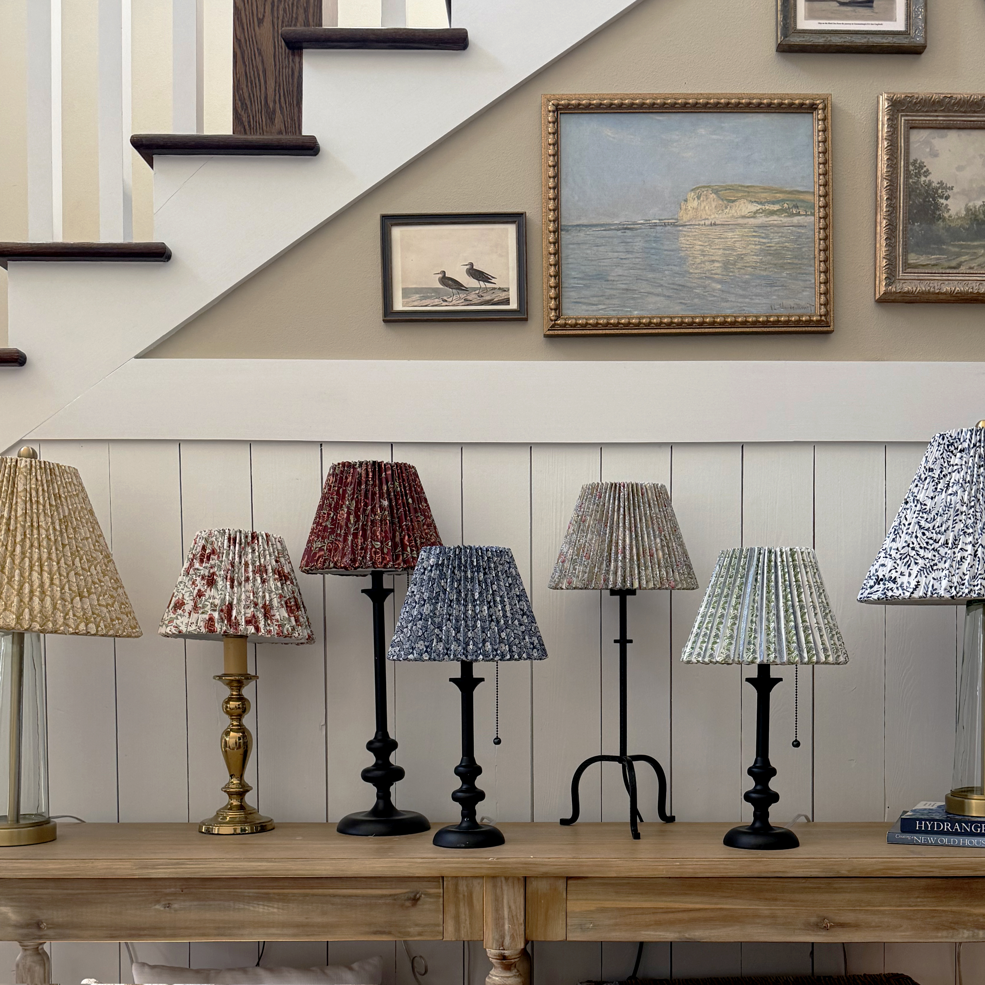 assorted table lamps with patterned pleated shades