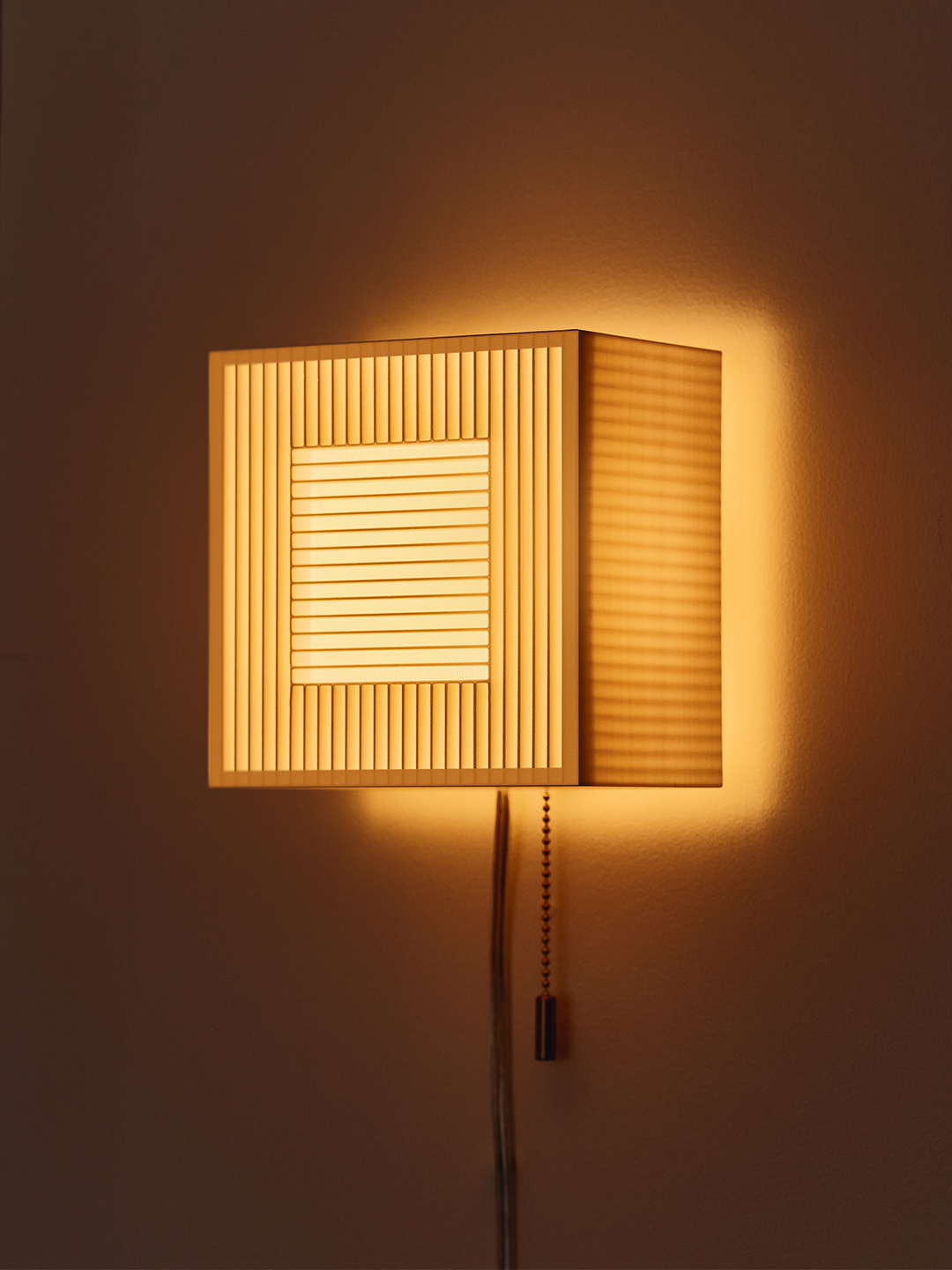 illuminated cube shaped sconce