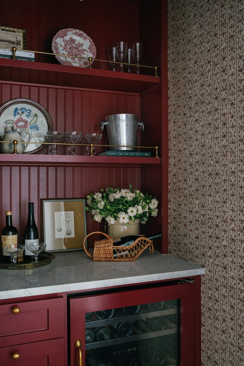 closet with wallpaper and red shelves