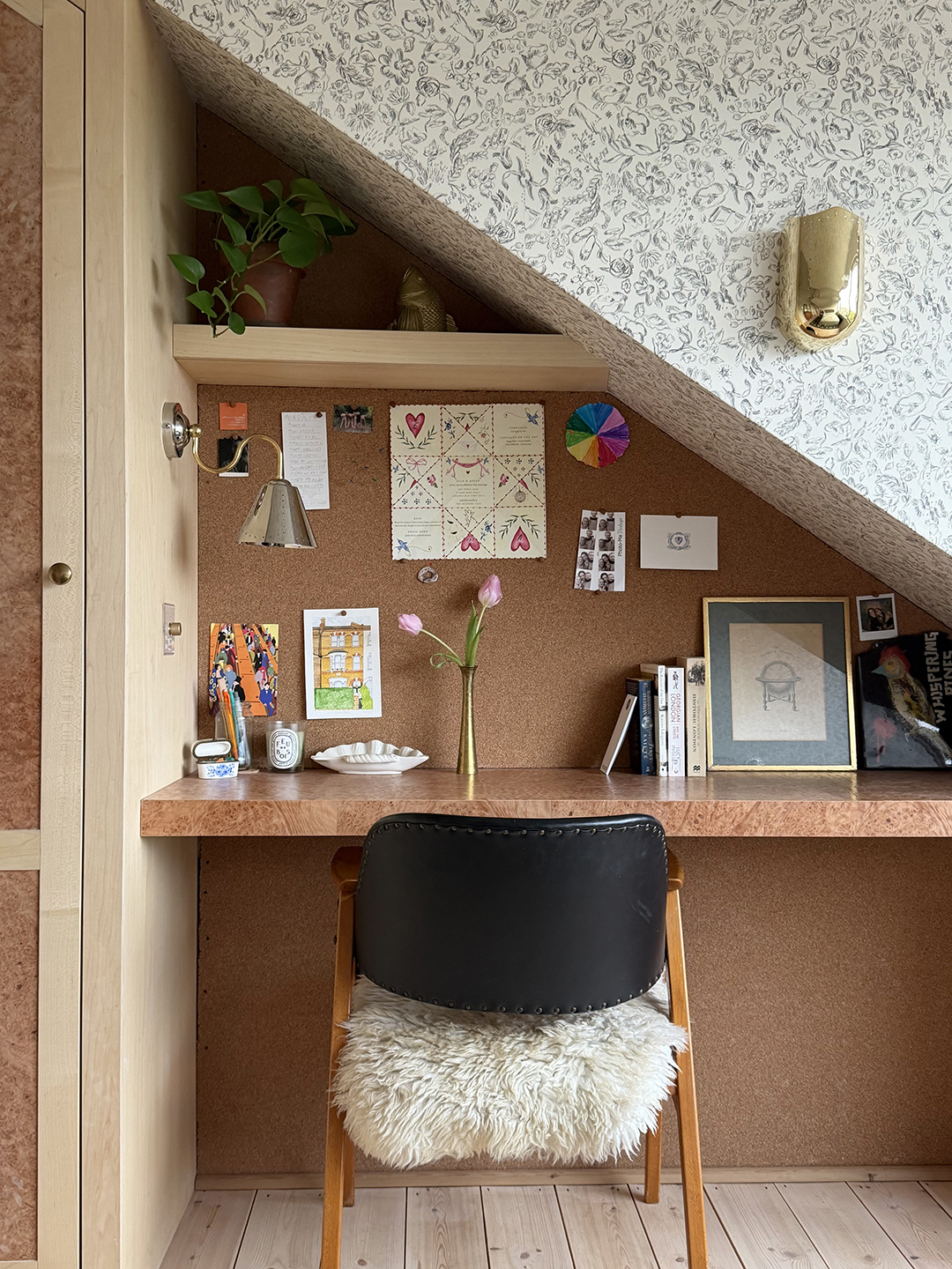 triangular desk area with chair