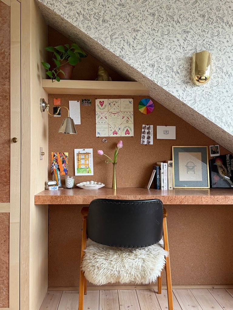 triangular desk area with chair
