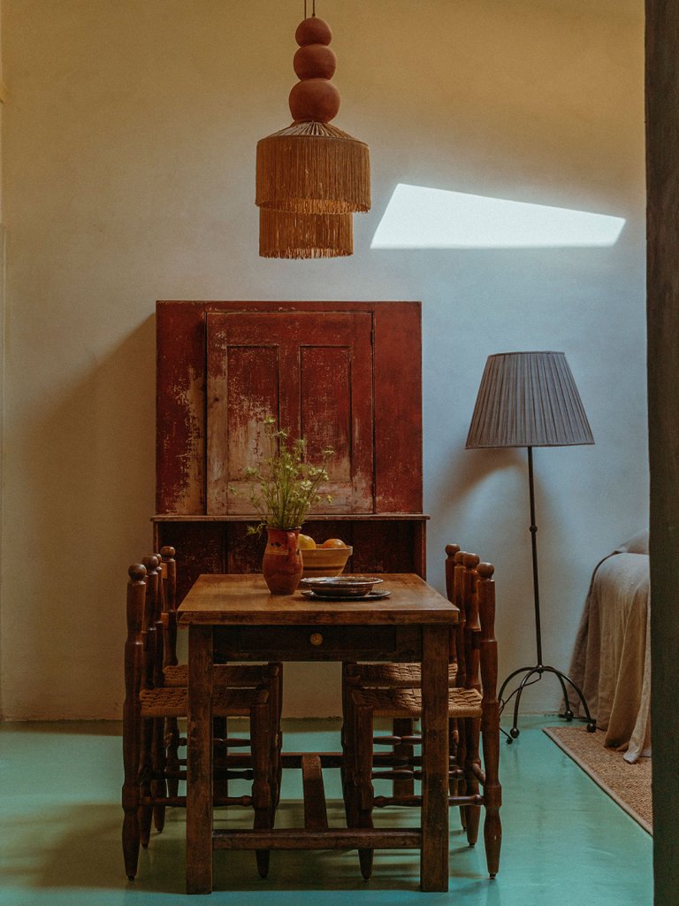 carriage house interior with wood table and hutch