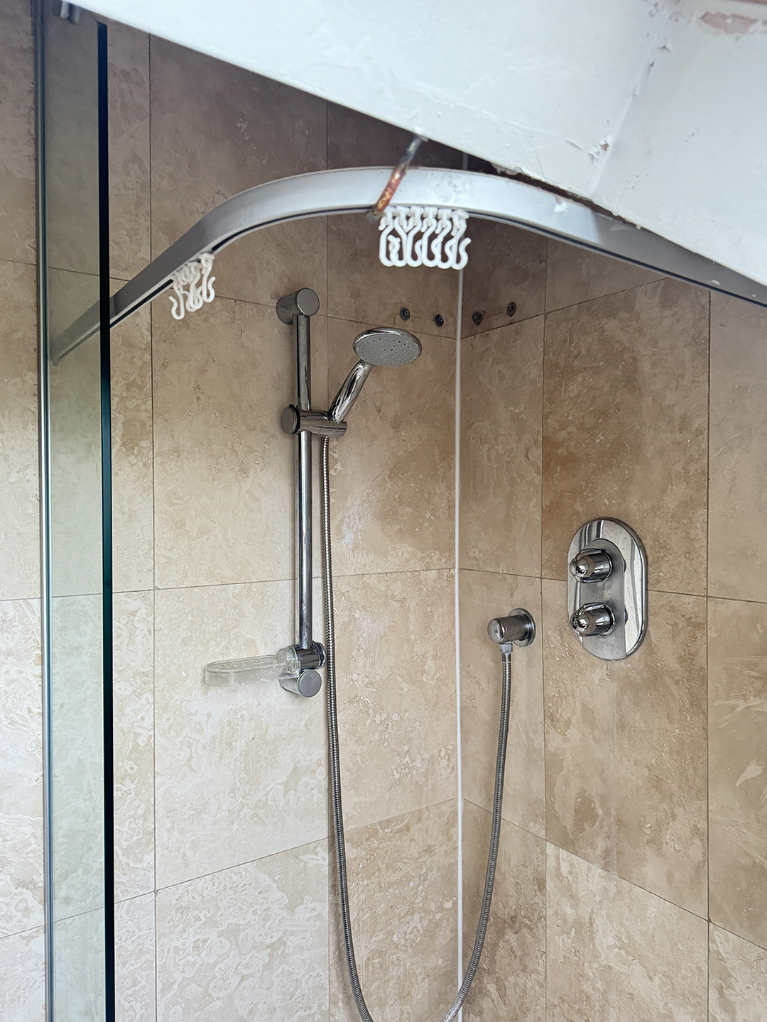 shower area with fixtures
