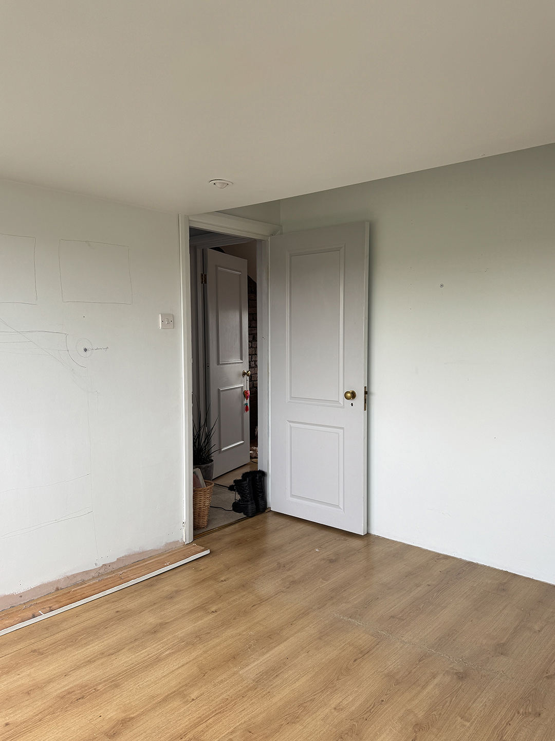 empty white room with open door