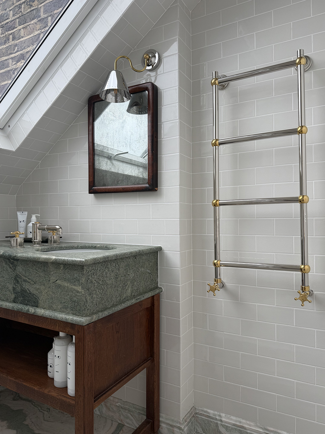 bathroom with green marble vanity