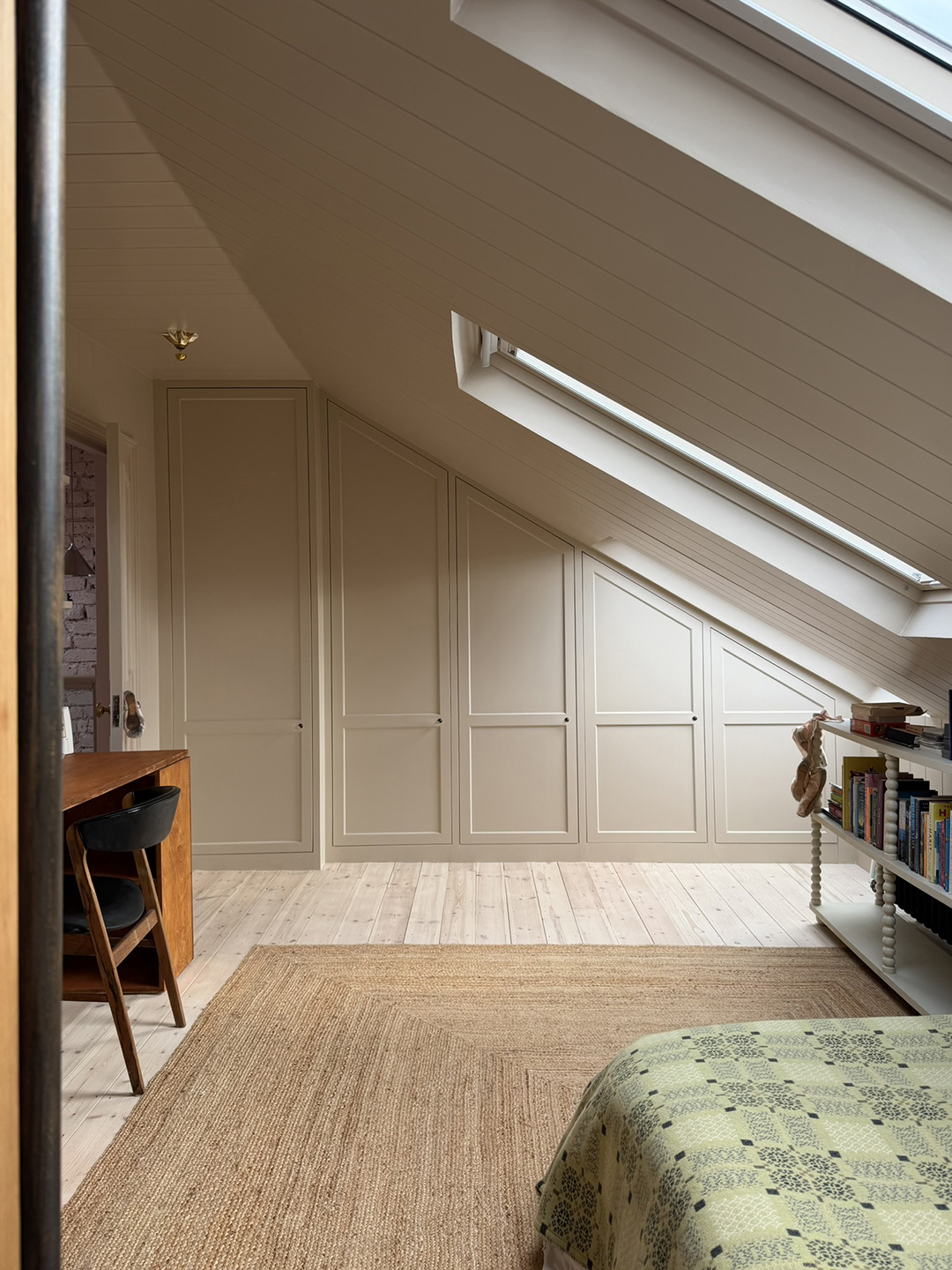 room with beige storage and jute rug