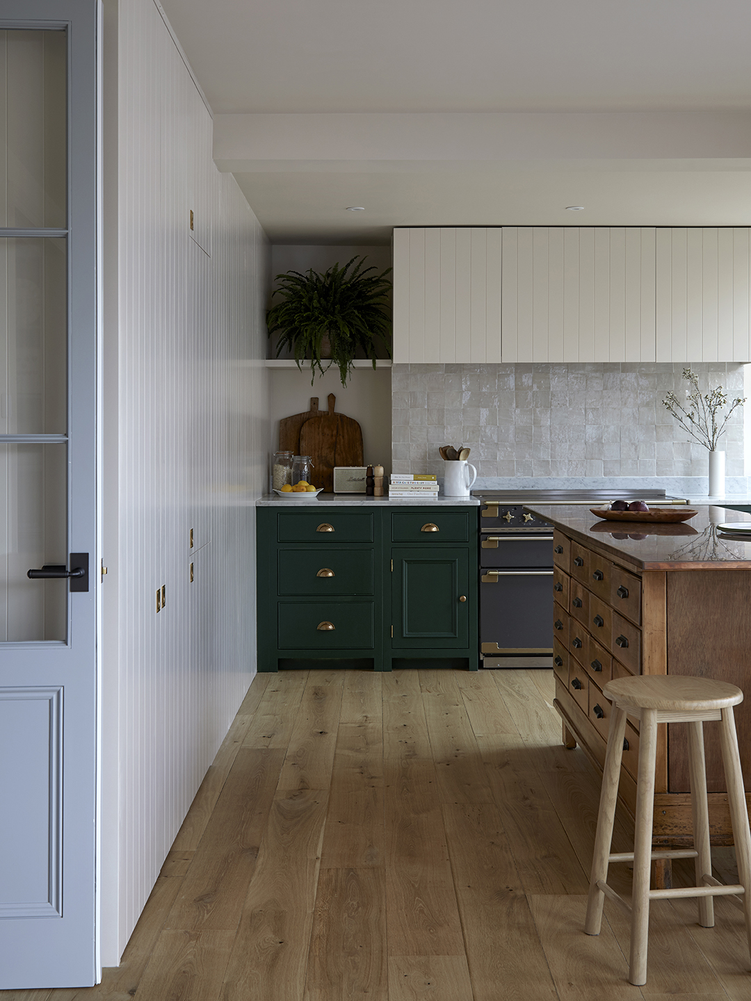 kitchen with white walls and tiled backsplash