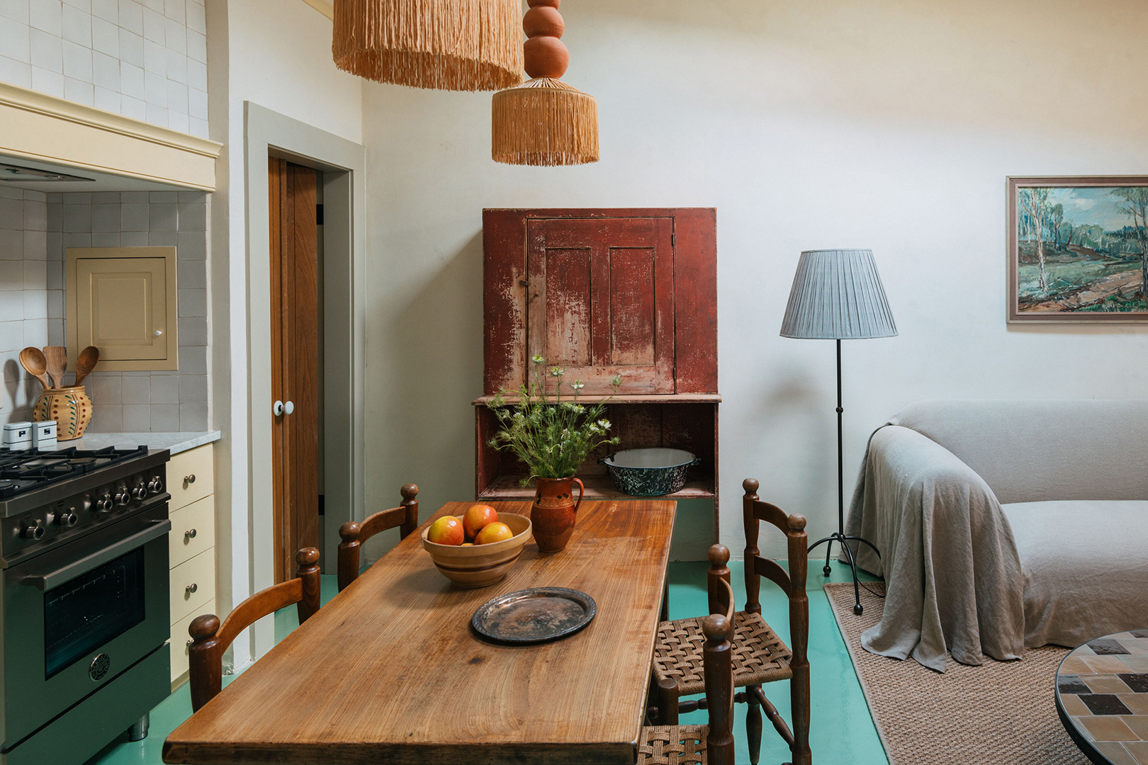 carriage house interior with wood table and hutch