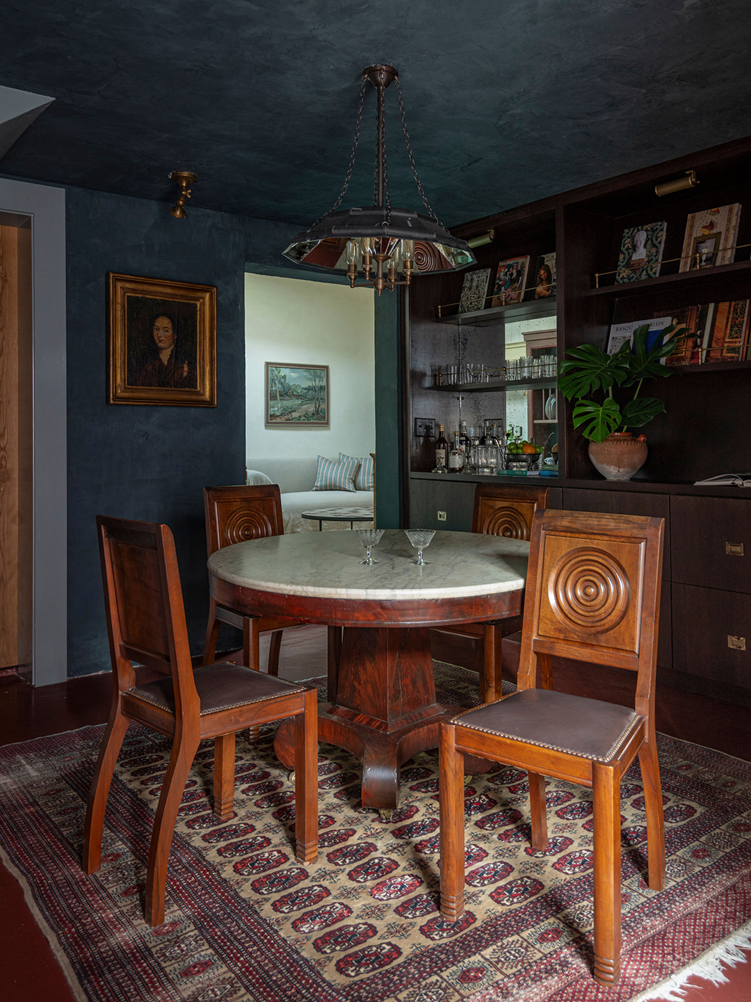 dining area with round table and wood chairs