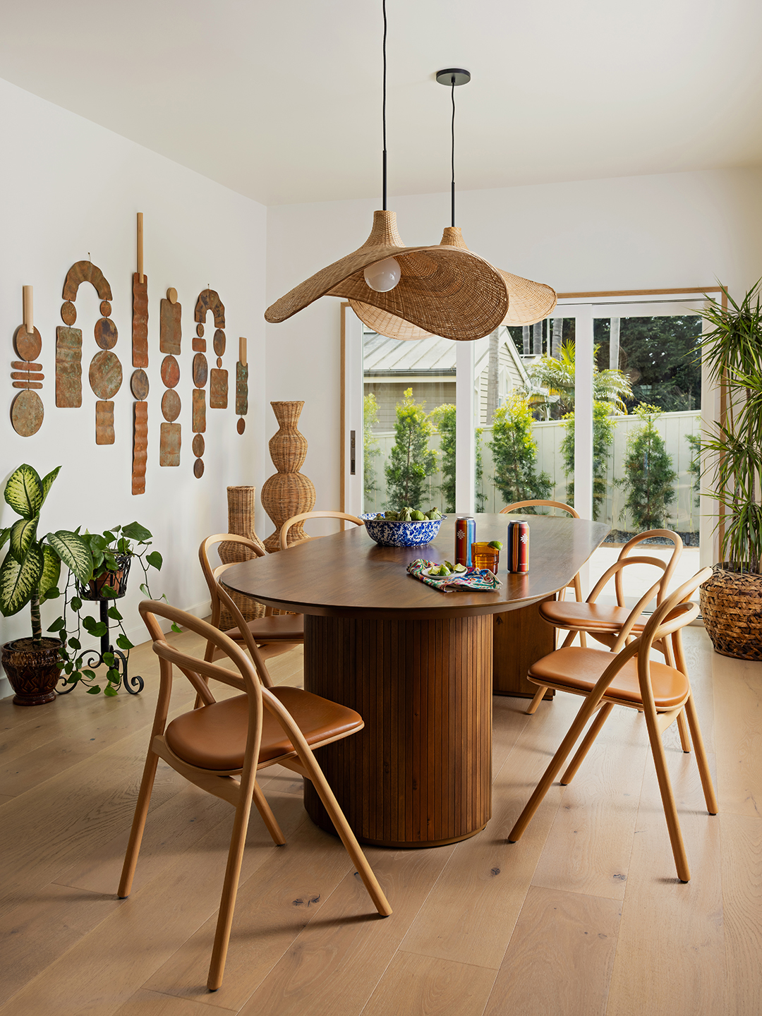 dining room with wood oval table and wood chairs