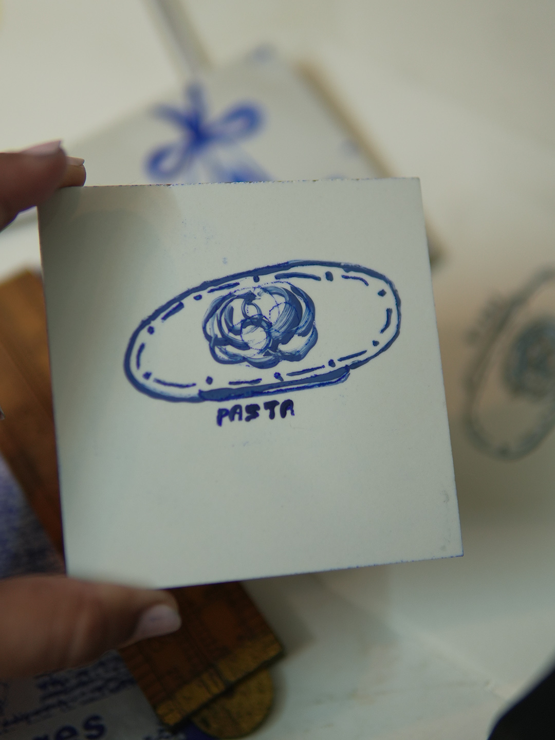 blue-and-white design on tile 