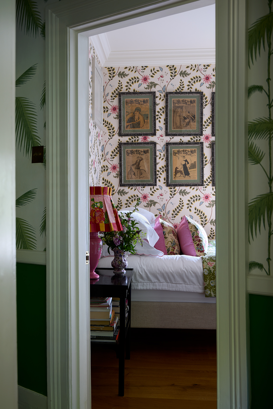 hallway and bedroom with patterned wallpaper