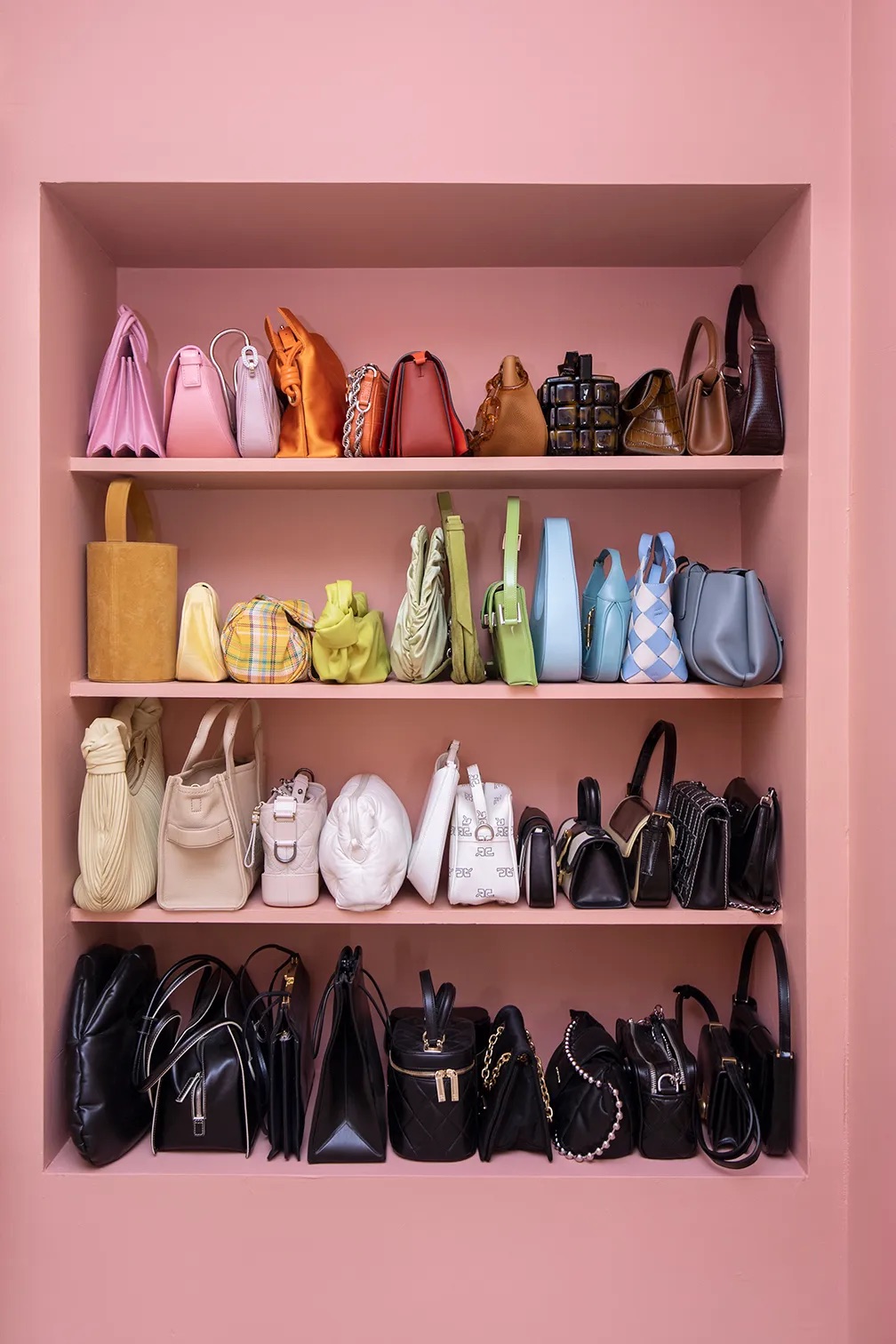 pink open shelving for handbags