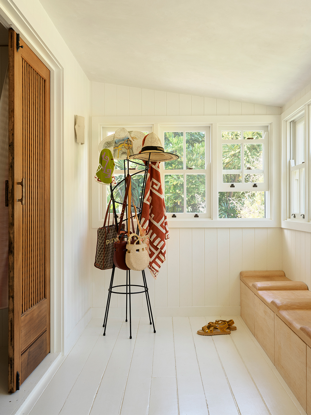 white porch with bench seating