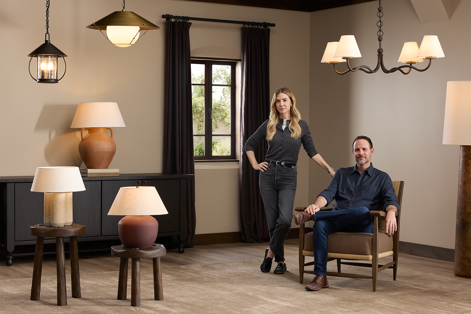 Amber Lewis and Adam Dunn and several light fixtures