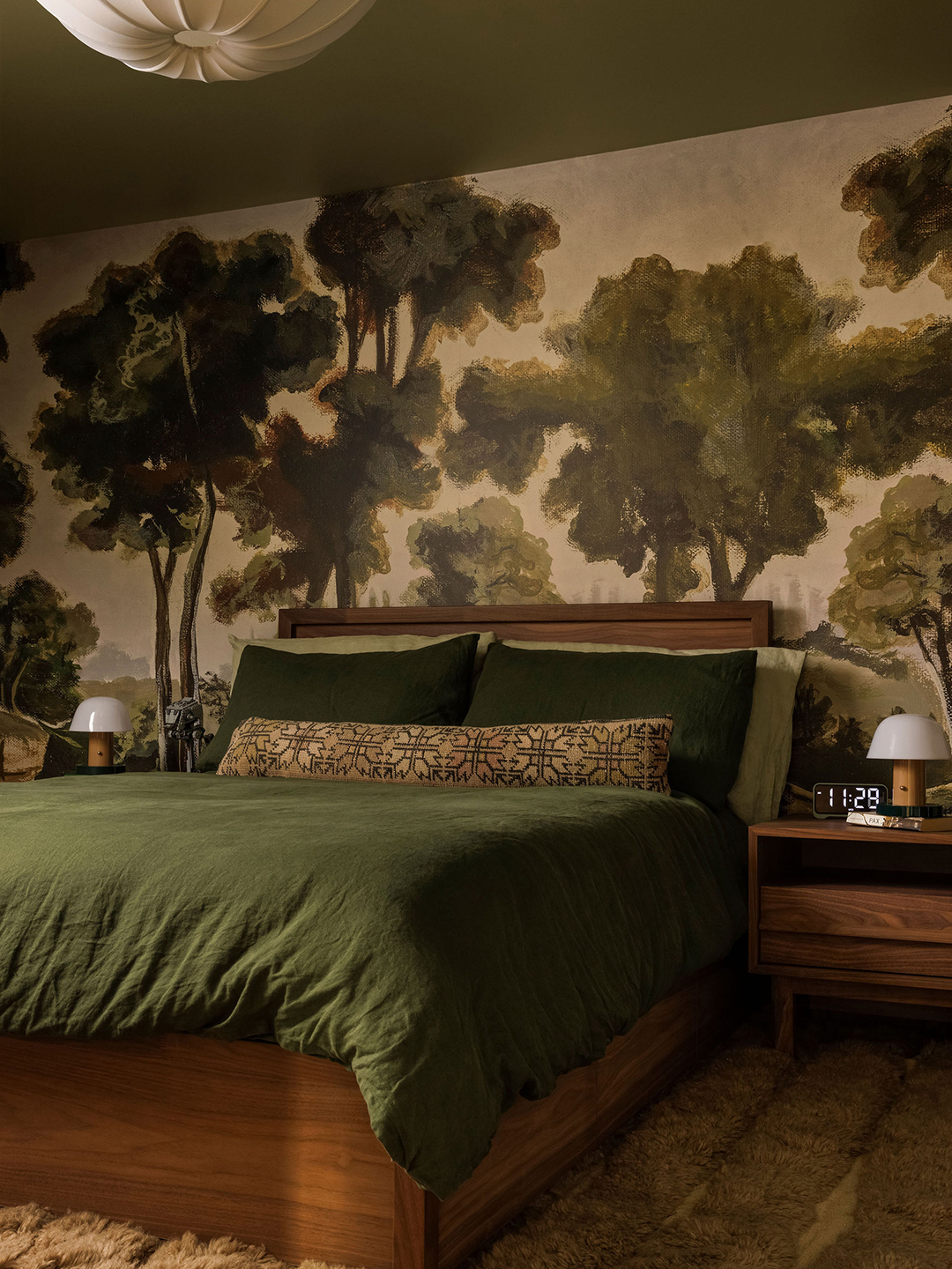 bedroom with tree mural
