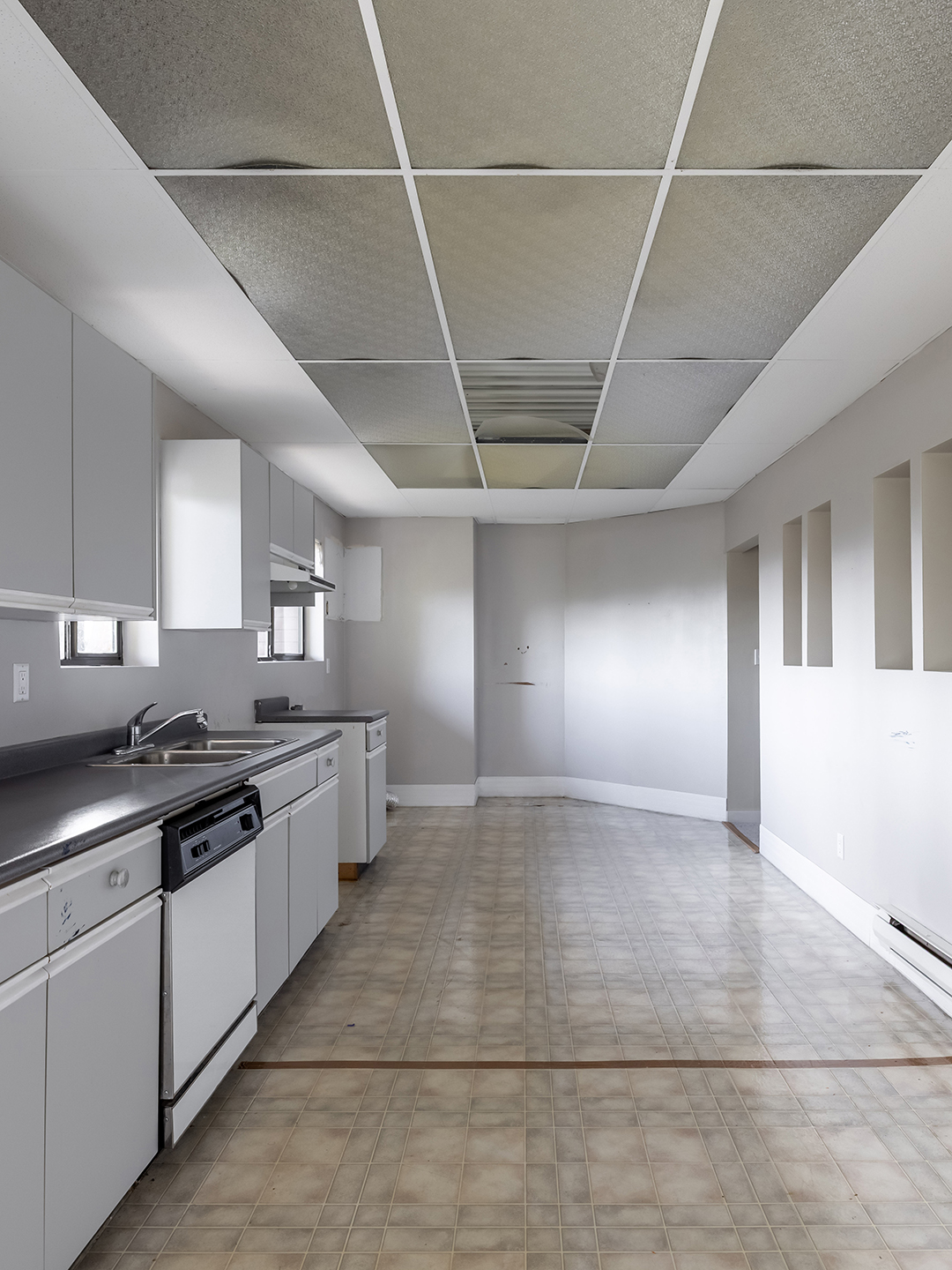 white kitchen space before renovation