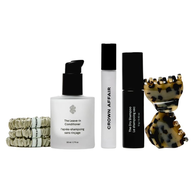 a set of five beauty items including a hair scrunchie and hair clip