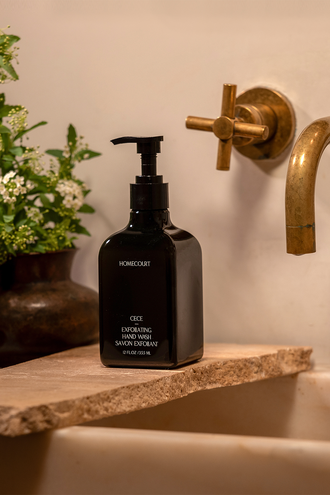 Homecourt exfoliating hand wash on bathroom vanity