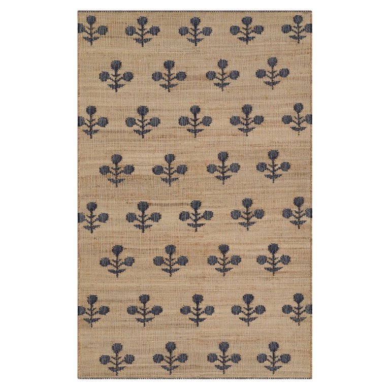 jute rug with navy floral pattern