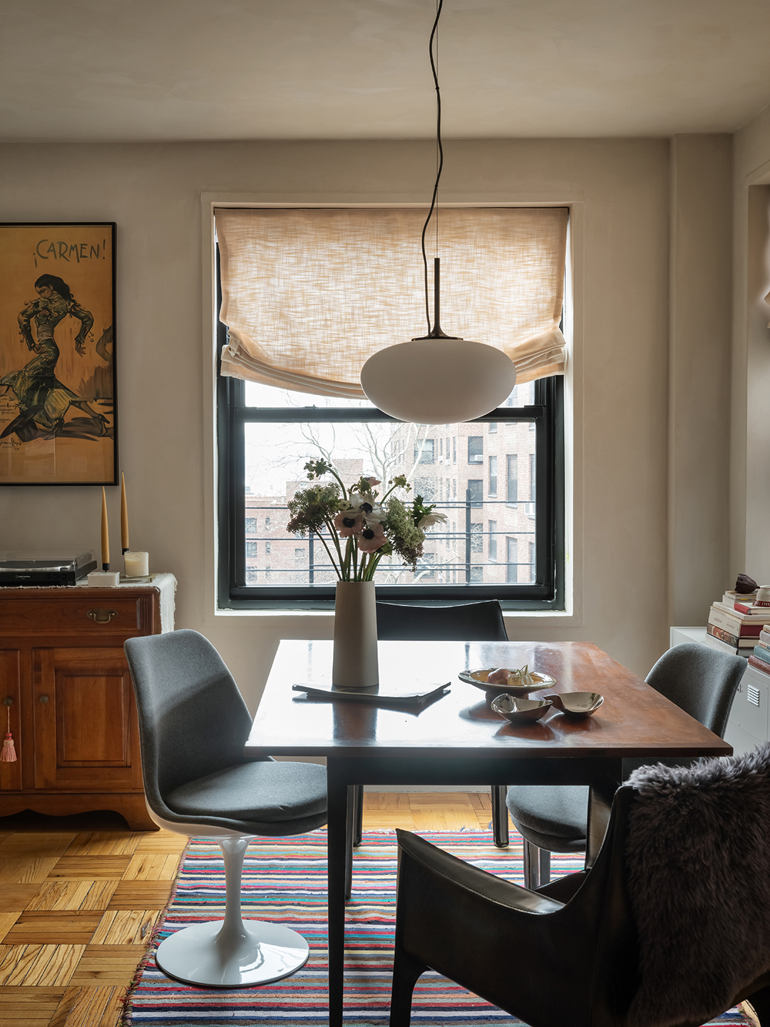 dining area with low pendant and a few chairs