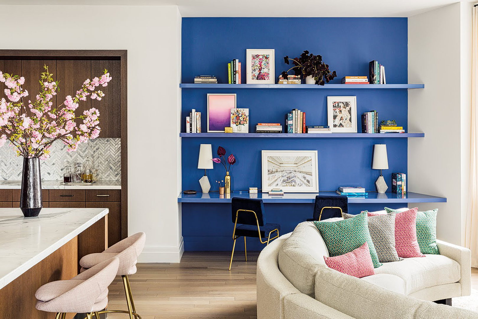 white room with blue office area