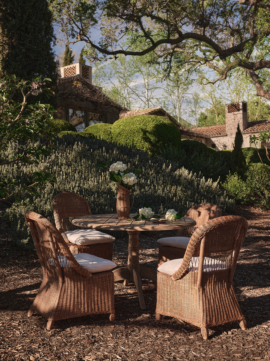 set of rattan furniture sitting outside