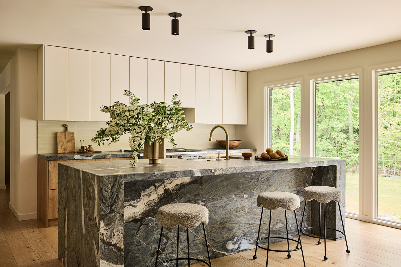 white kitchen with grey marble island