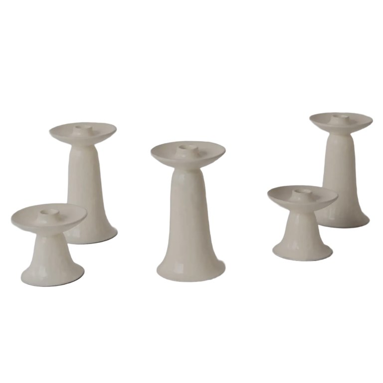 tall fluted white taper candle holders made out of ceramic