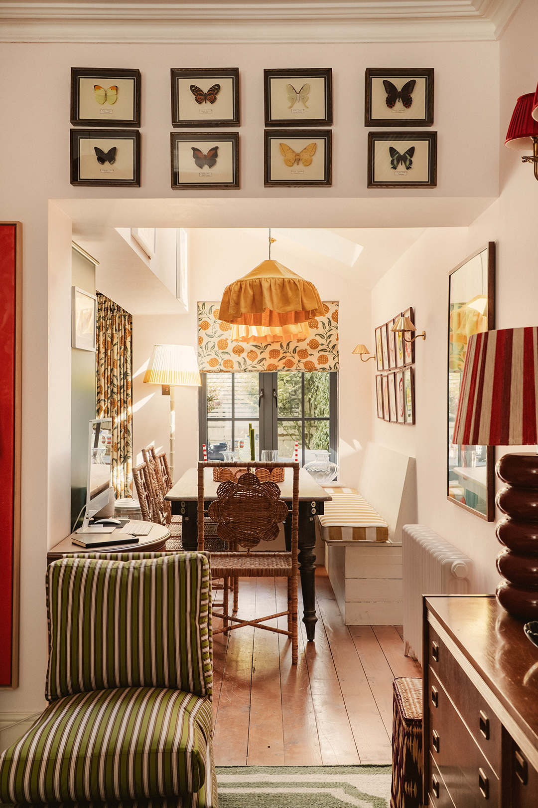 view into dining nook with lighting and art