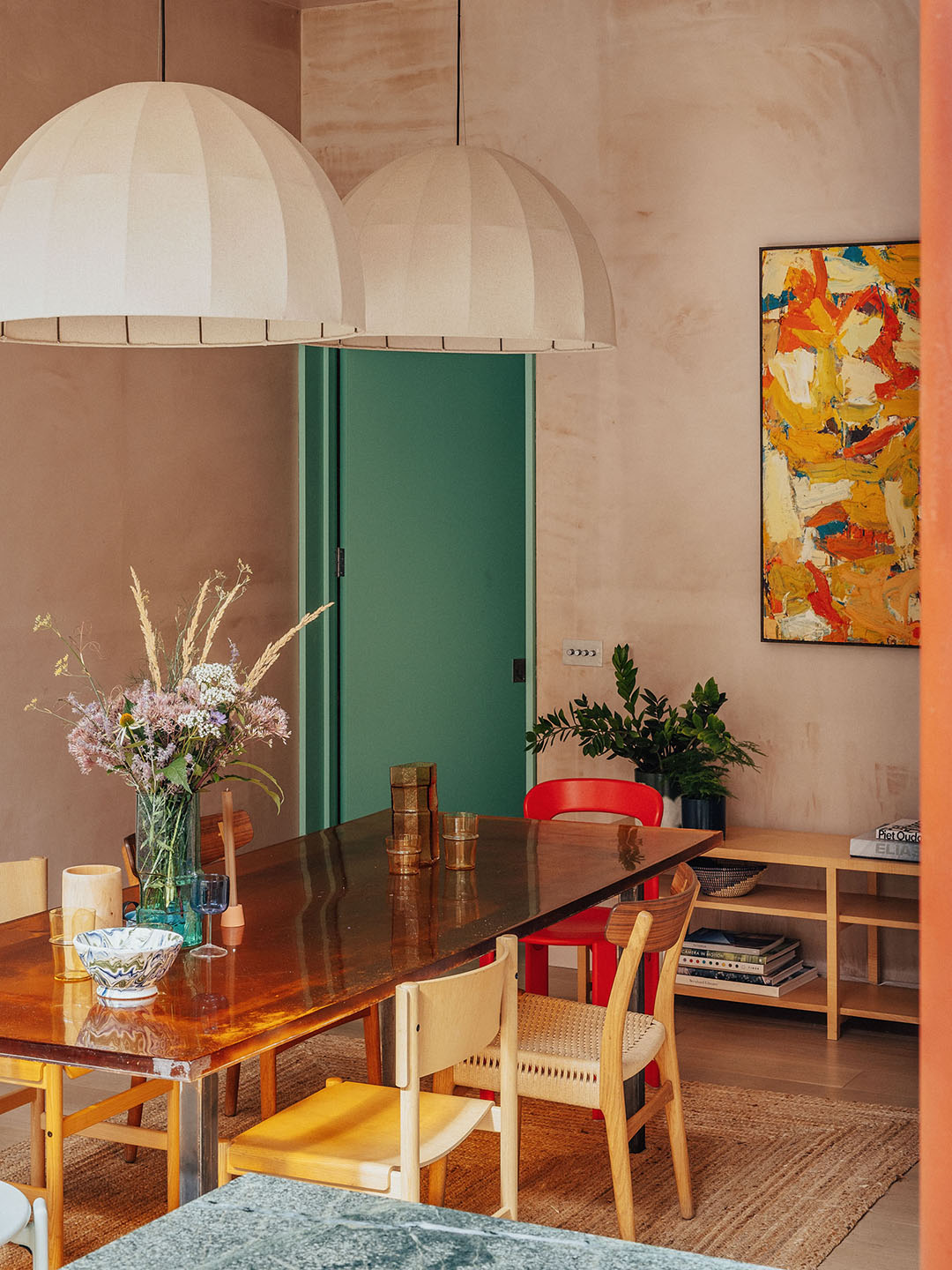 dining room with plaster walls and colorful pops