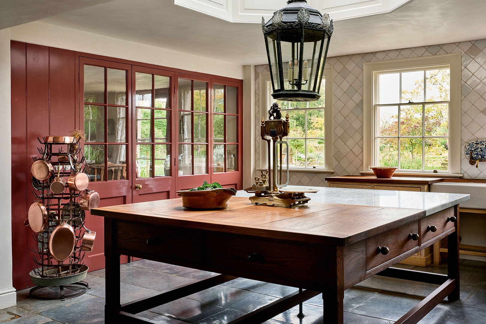 kitchen with island and red wall