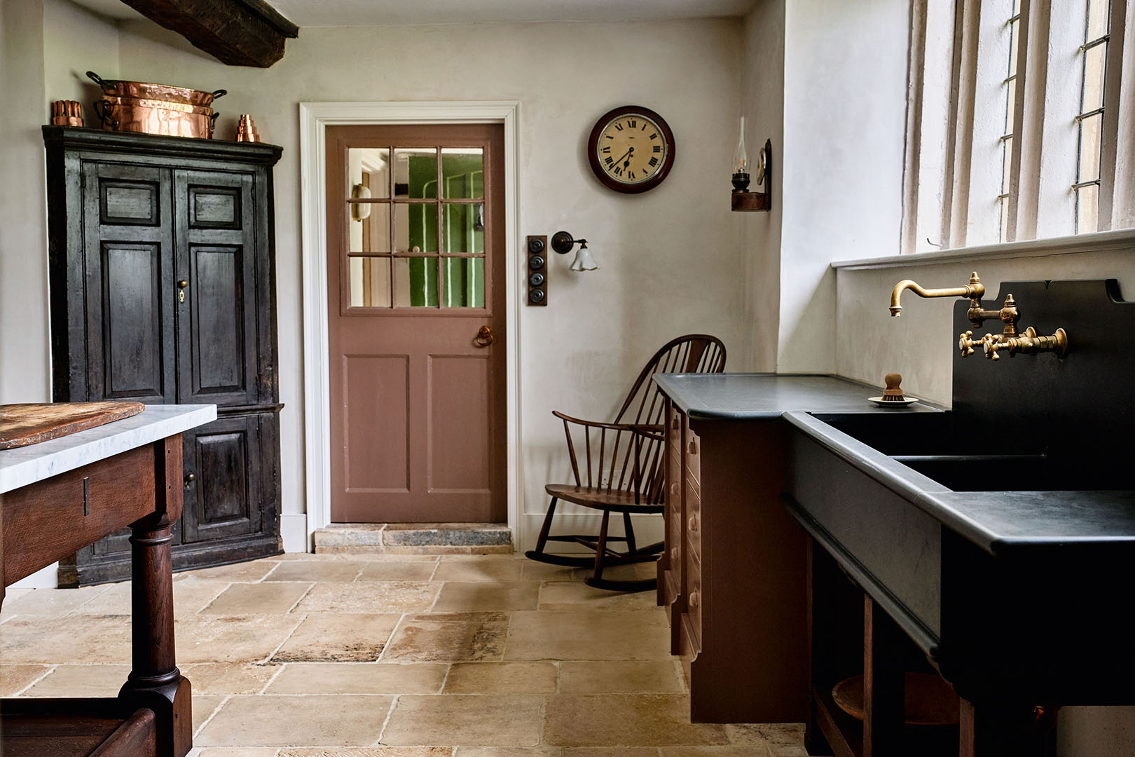 kitchen with black furniture and counters