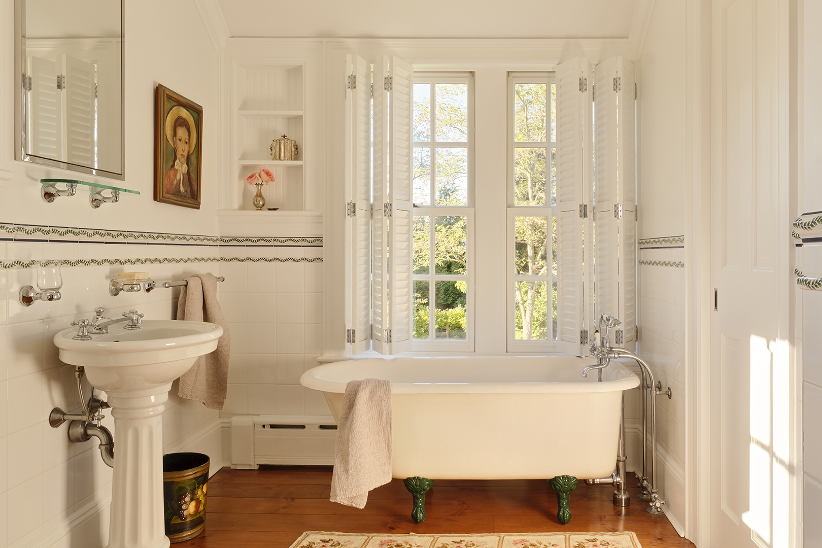 white bathroom with clawfoot tub