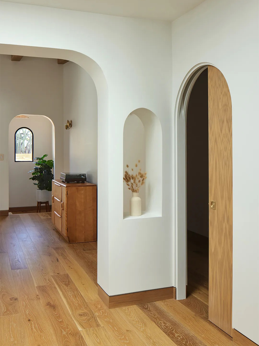 arched doorways in white interior