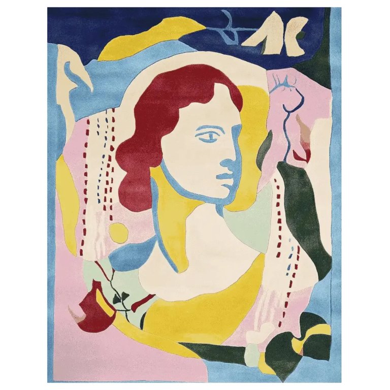 Rug with colorful portrait of a woman looking in profile.