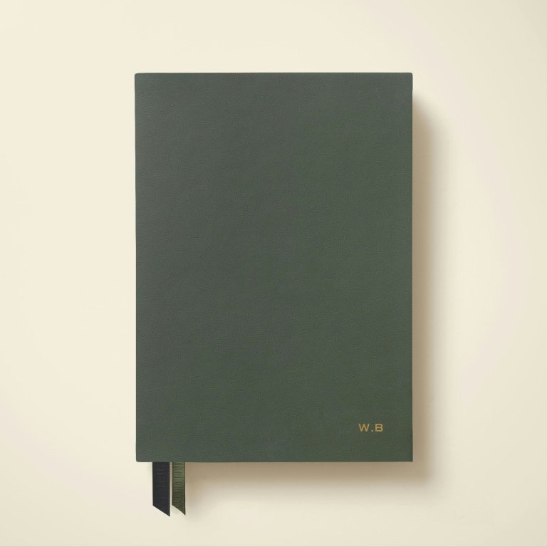 green leather bound notebook