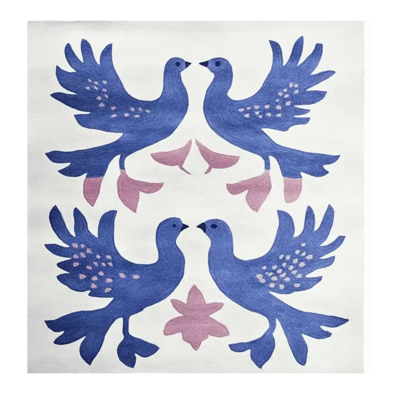 White children's rug with four deep blue doves.