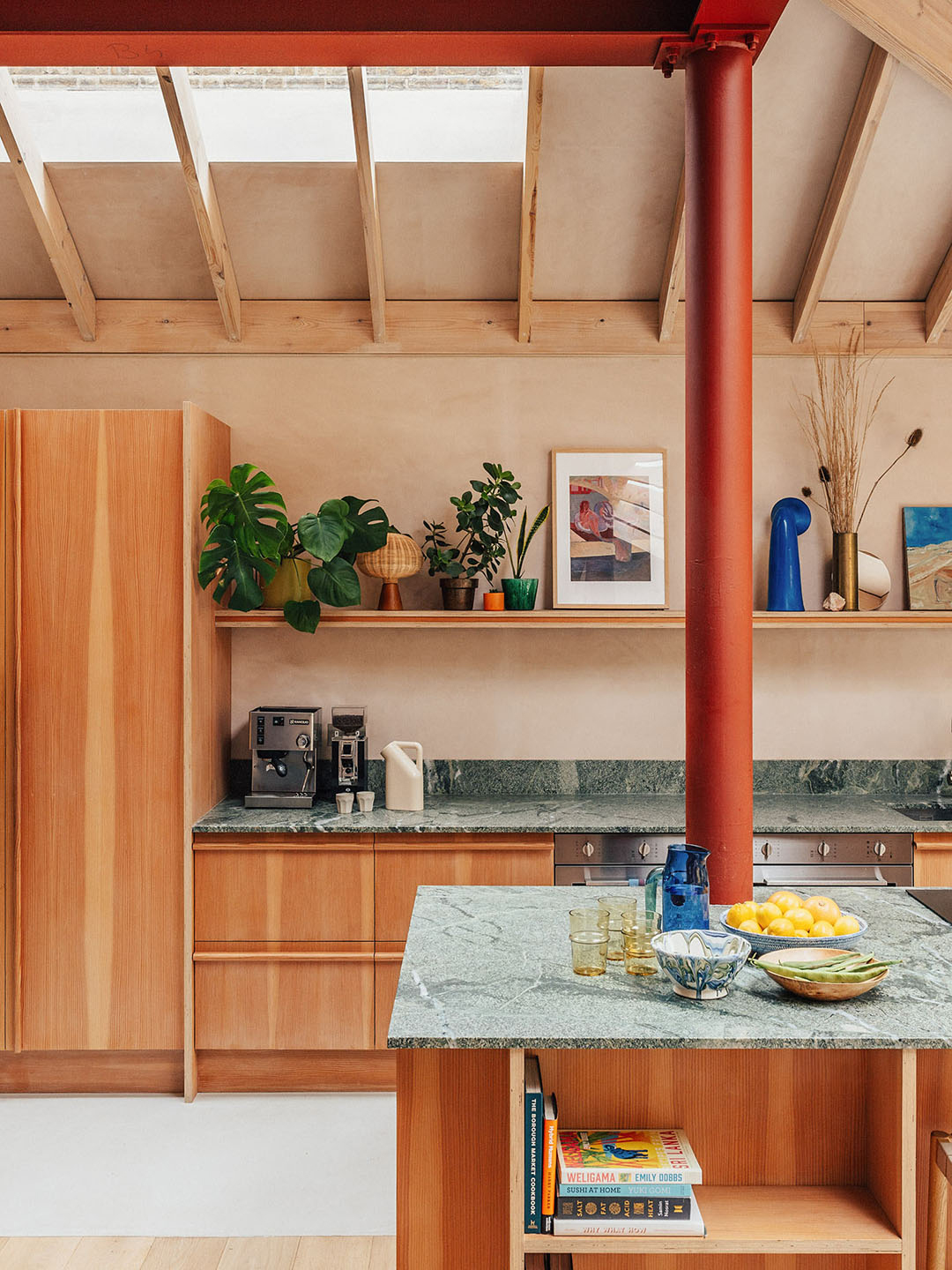kitchen with colored beam and structural supports