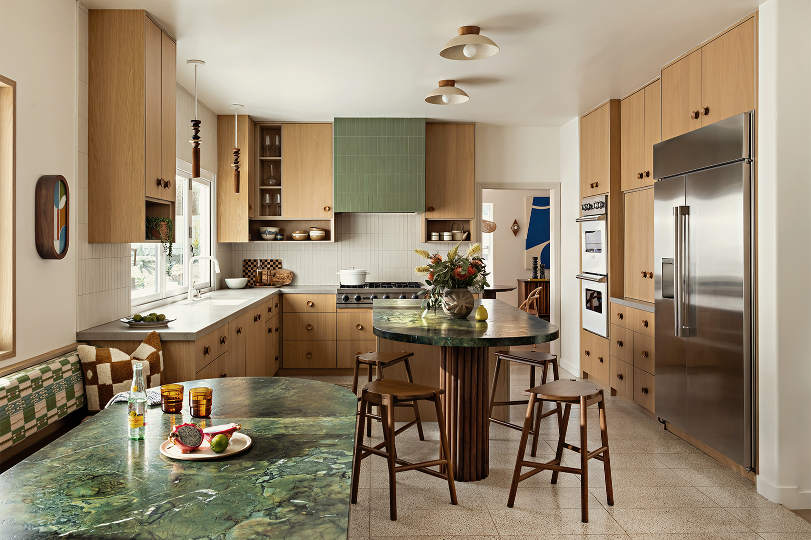 kitchen with wood cabinets and sage green accents