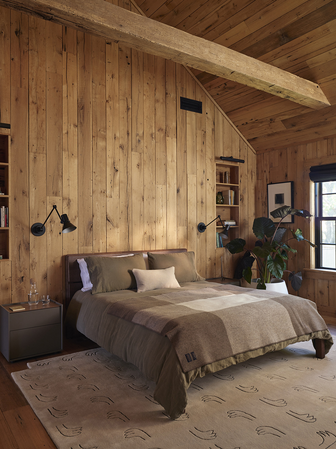 wood-paneled bedroom