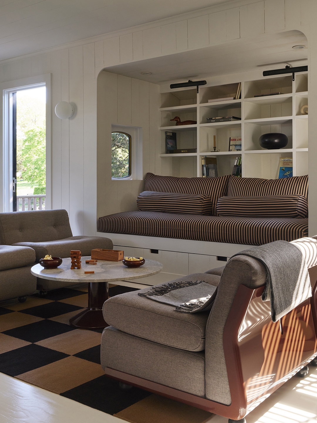 striped seating area with built-in sofa nook