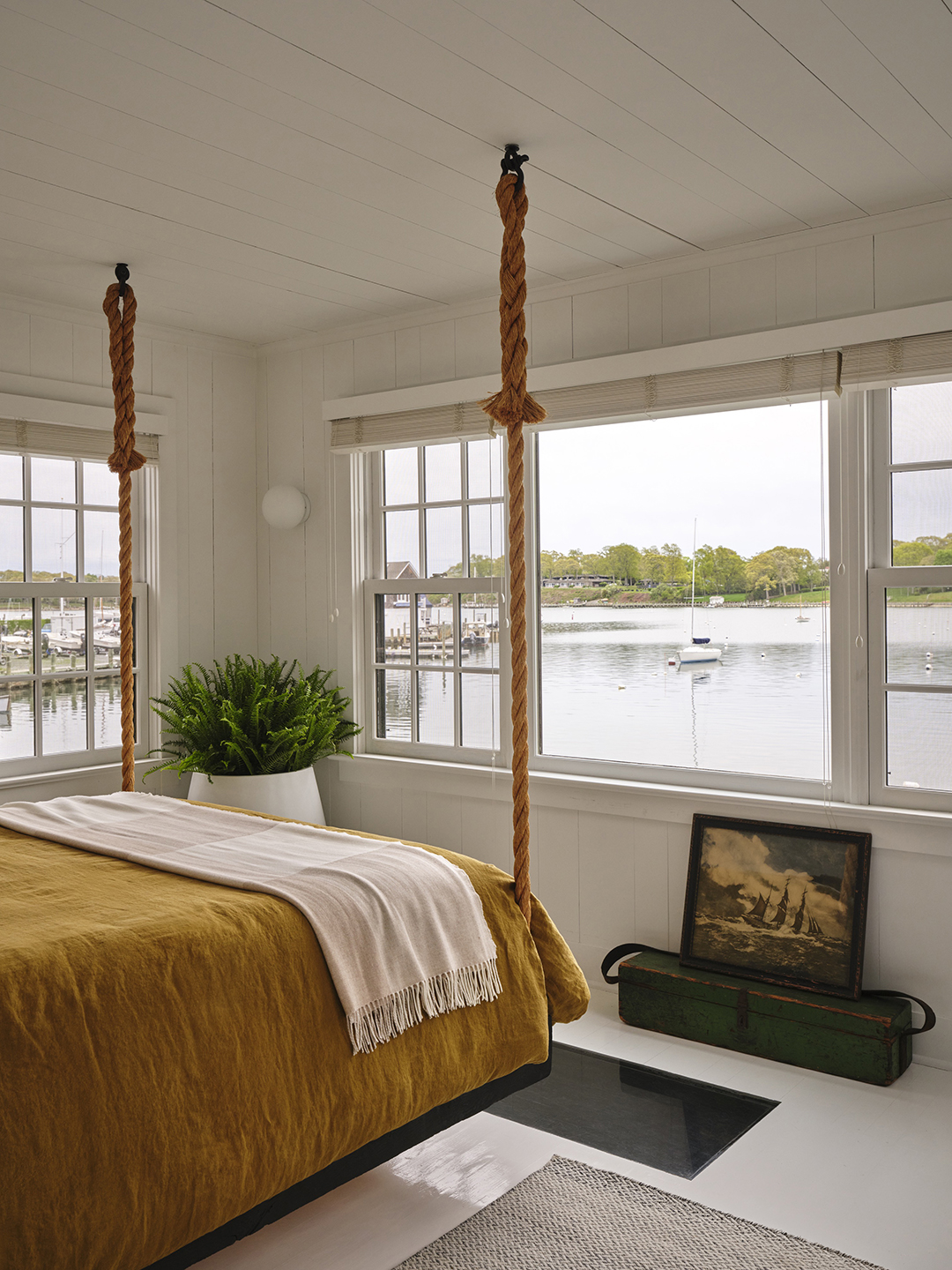 hanging rope bed looking out of bay