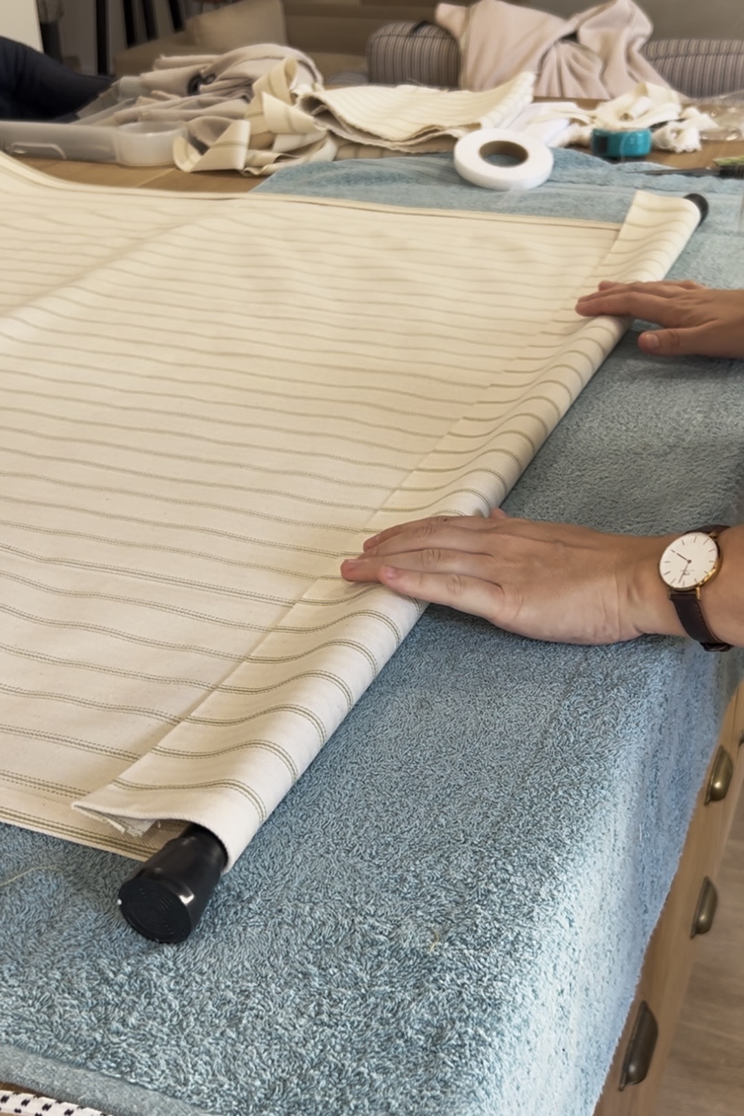 rolling fabric over a rod