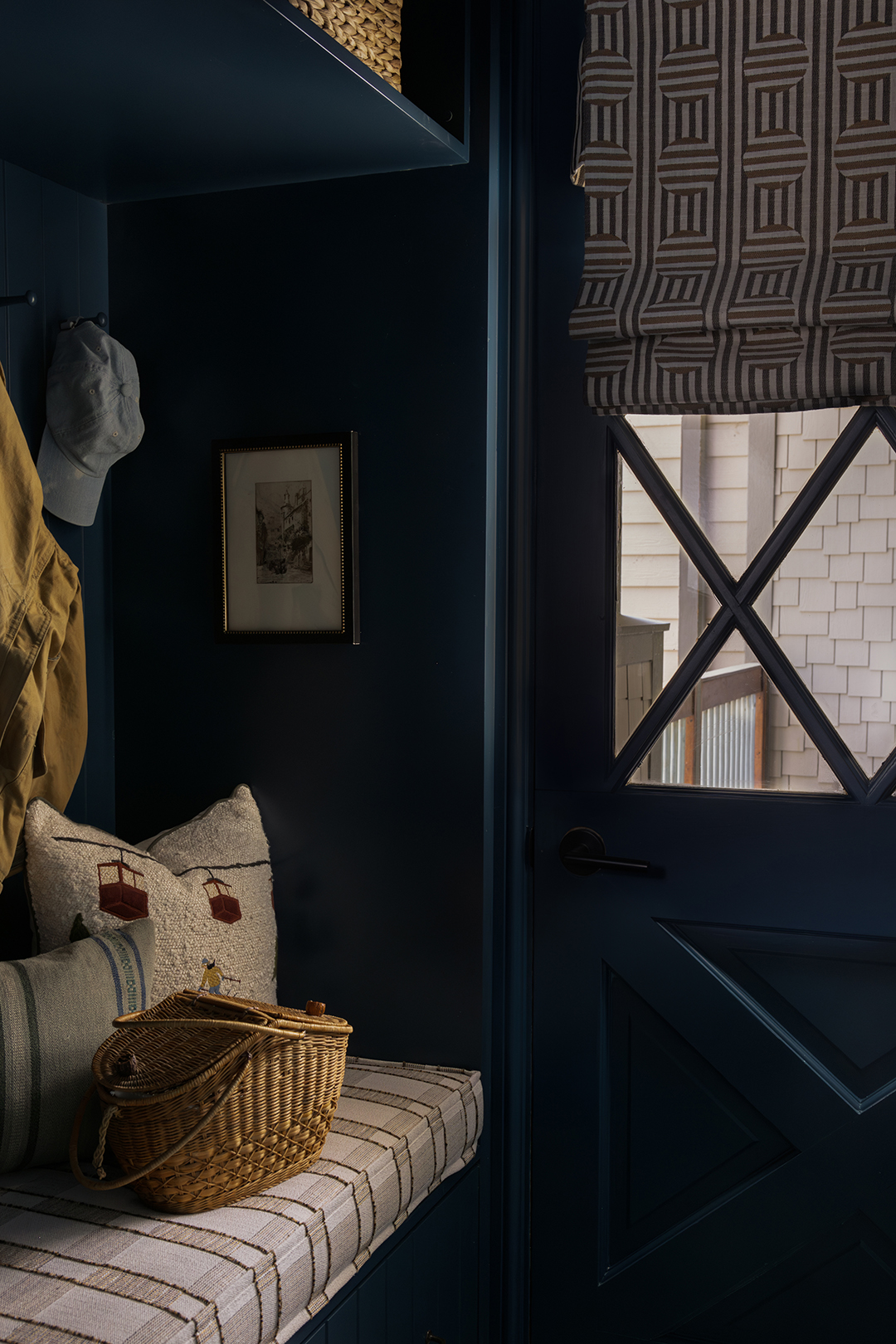 navy color-drenched mudroom