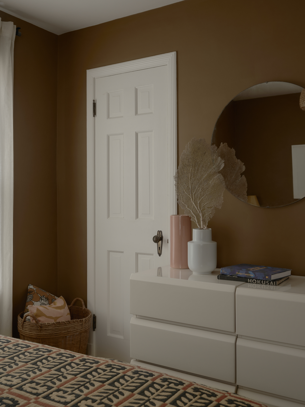 brown bedroom with white dresser