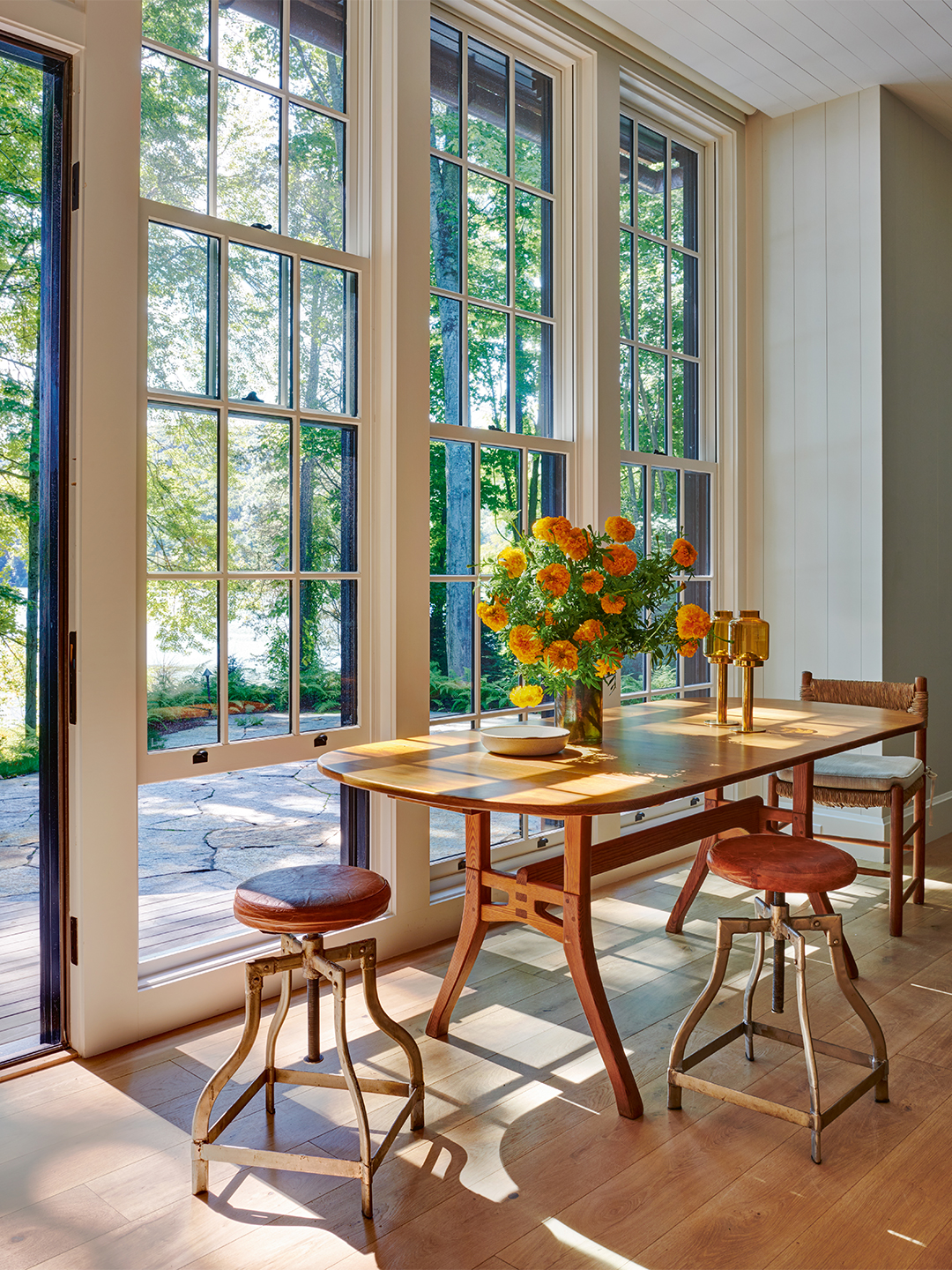 sunroom with breakfast table and stools