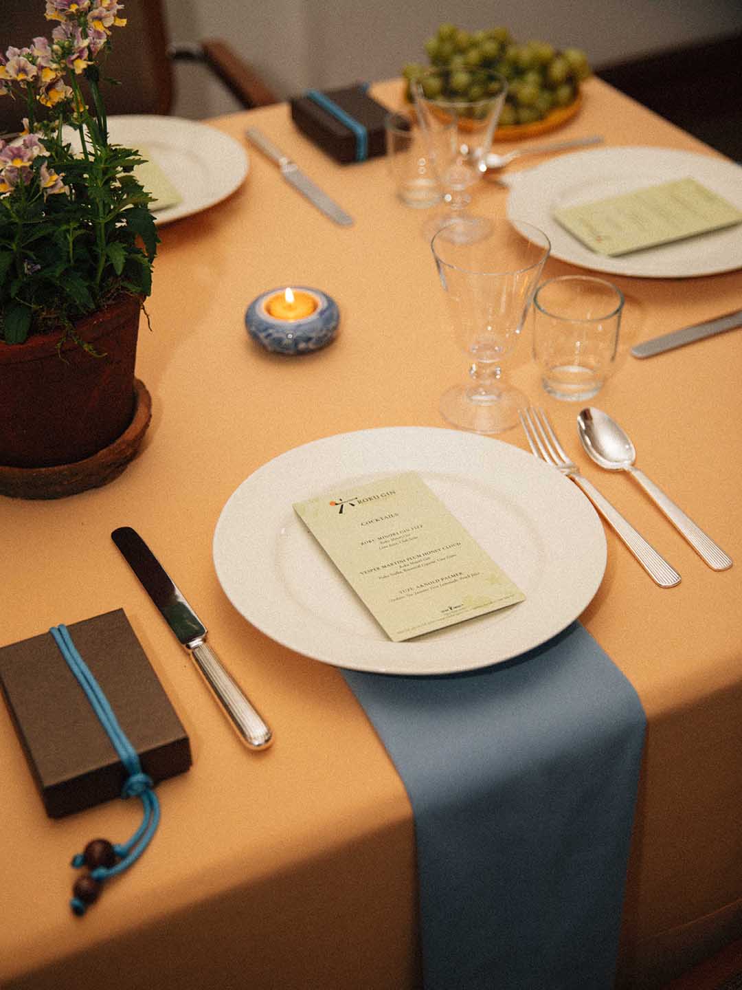 spring table with peach tablecloth